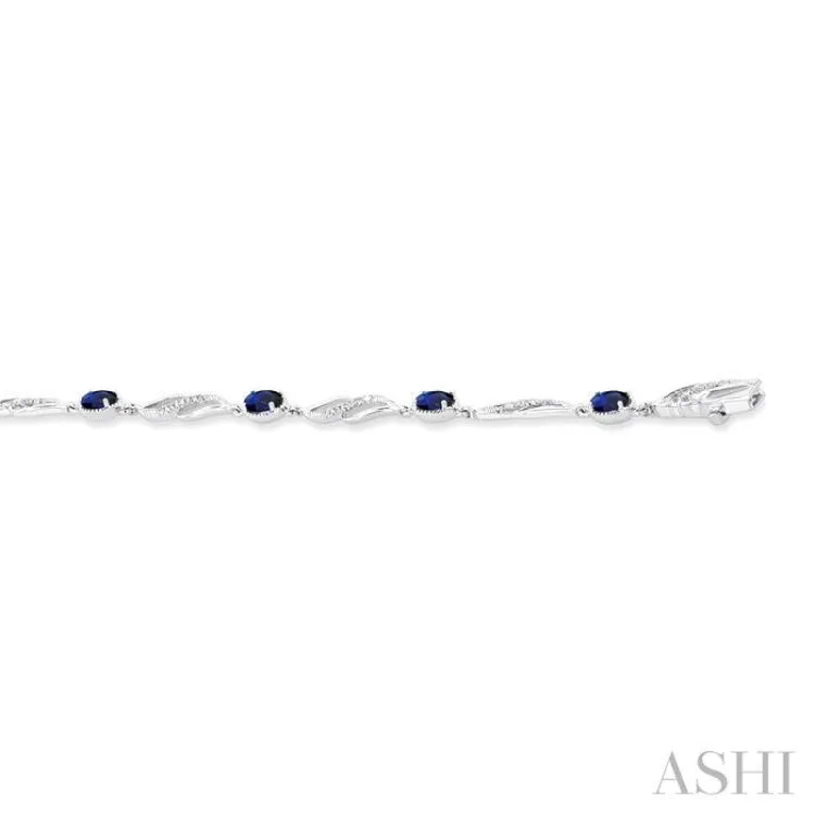 4X3 MM Oval Cut Sapphire and 1/5 ctw Round Cut Diamond Precious Eternity Link Tennis Bracelet in 10K White Gold