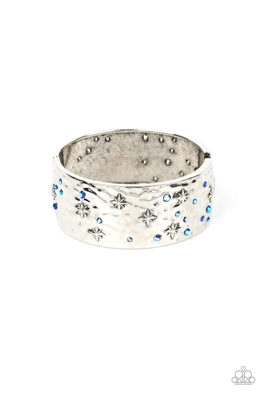 Across the Constellations - Blue - Iridescent Rhinestone Star Paparazzi Hinge Bracelet