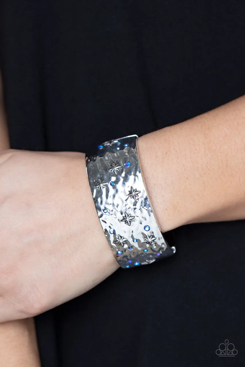 Across the Constellations - Blue - Iridescent Rhinestone Star Paparazzi Hinge Bracelet