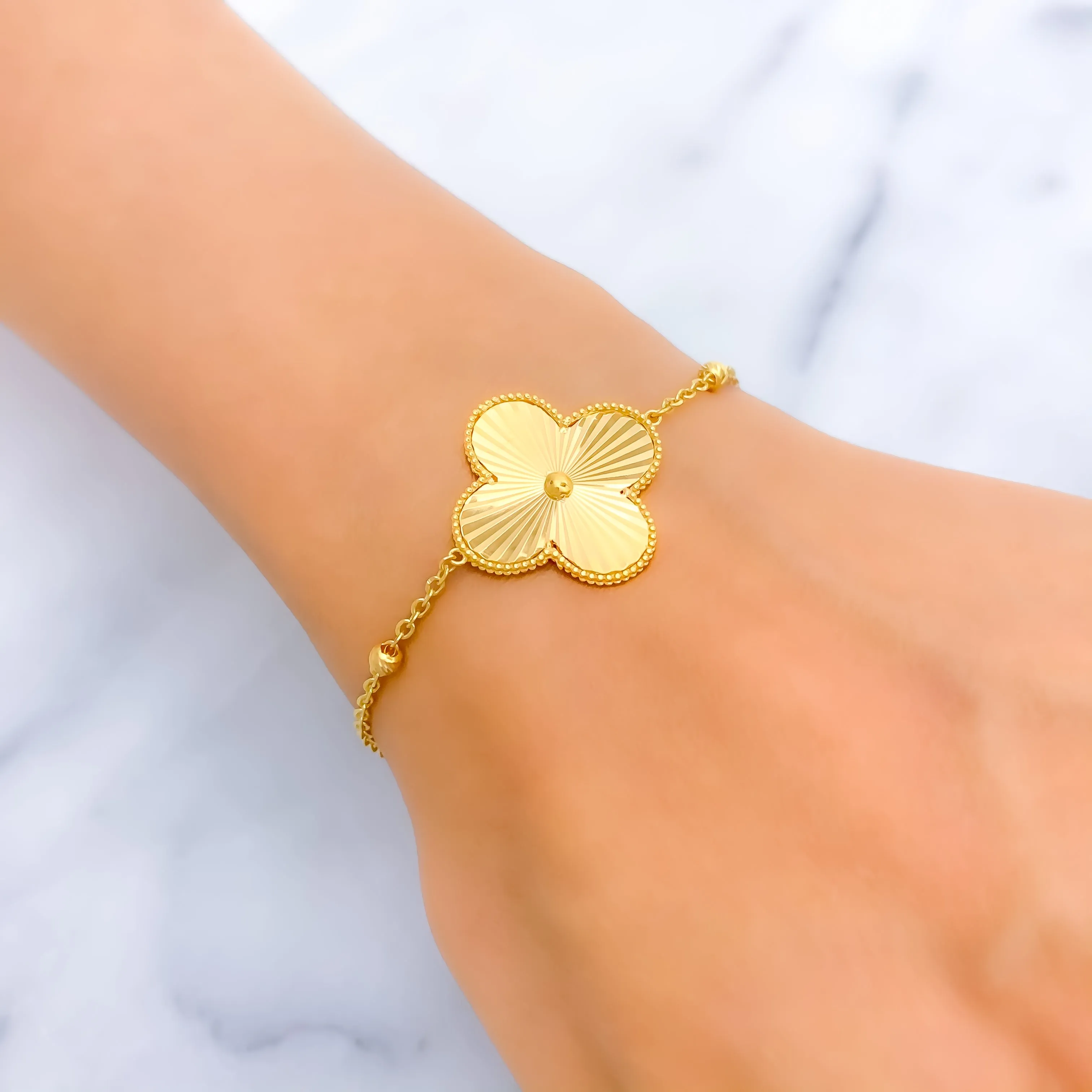 Dazzling Striped Floral 21k Gold Bracelet