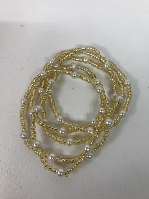 Pearl and gold bead stacks Bracelets