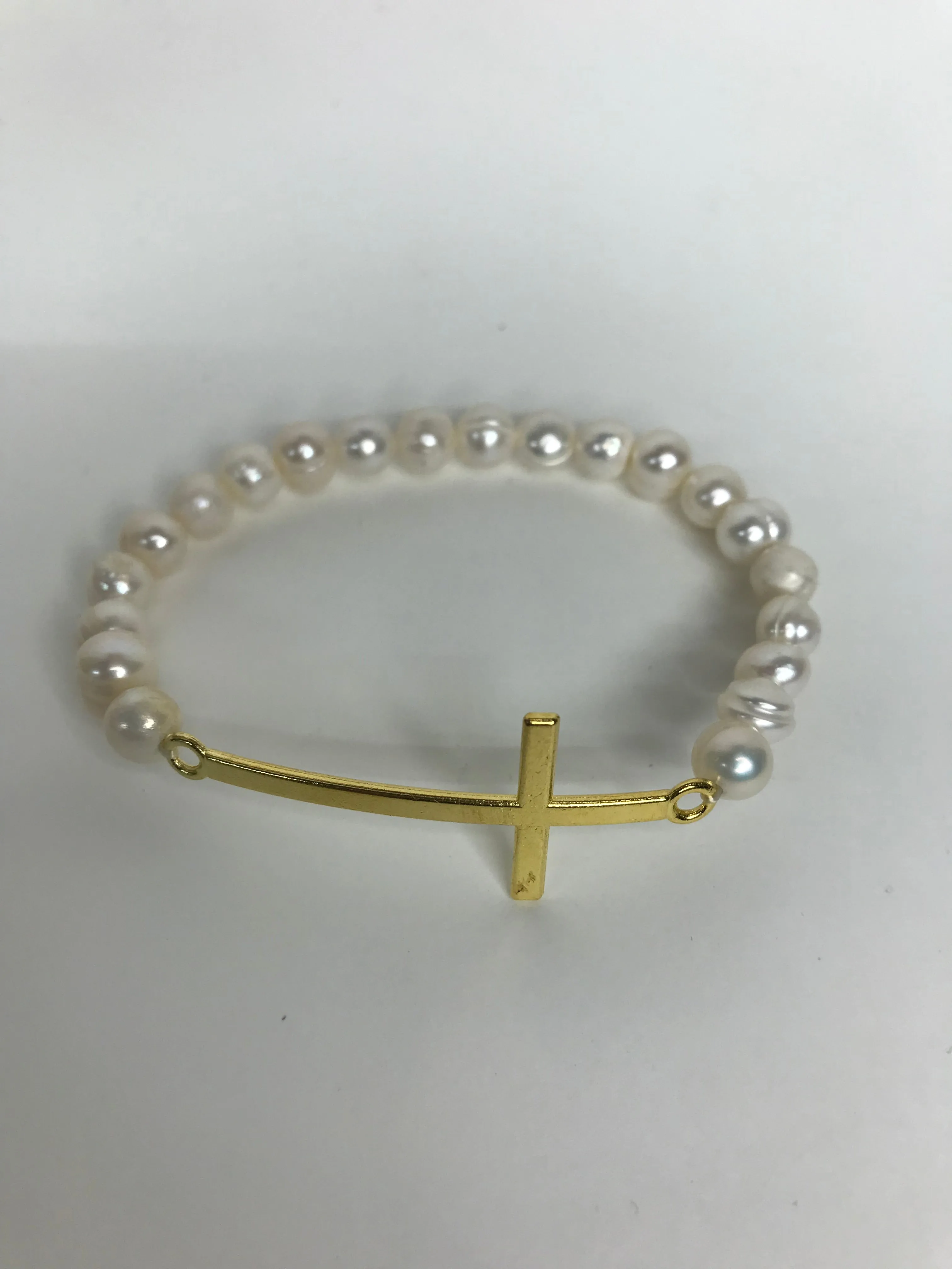 Pearl and gold bead stacks Bracelets