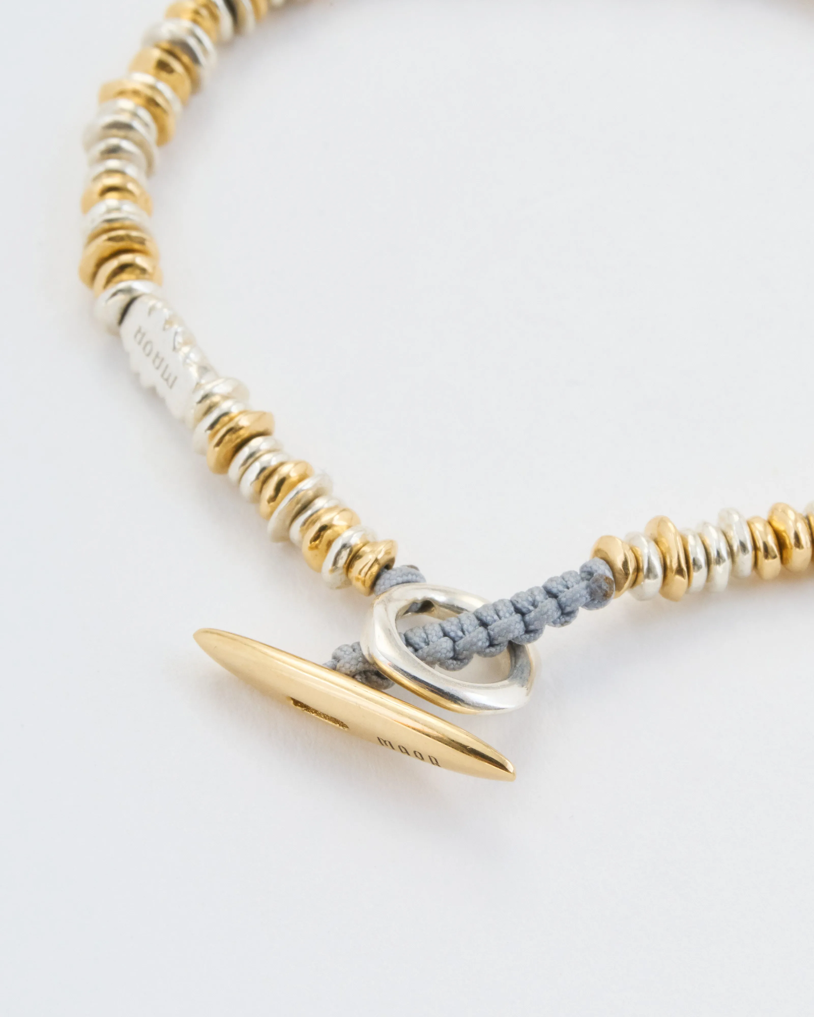 pilla sterling silver and yellow gold bracelet