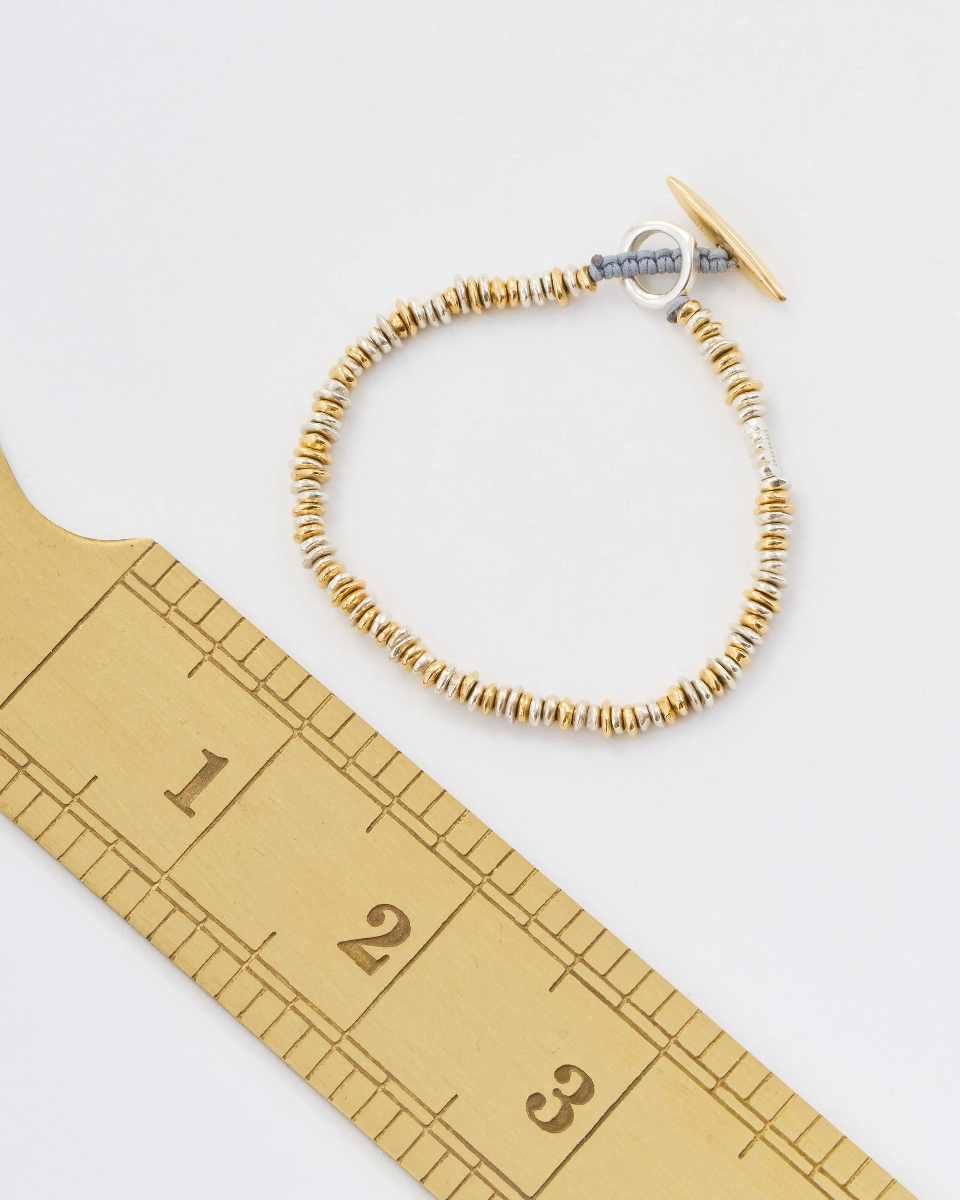 pilla sterling silver and yellow gold bracelet