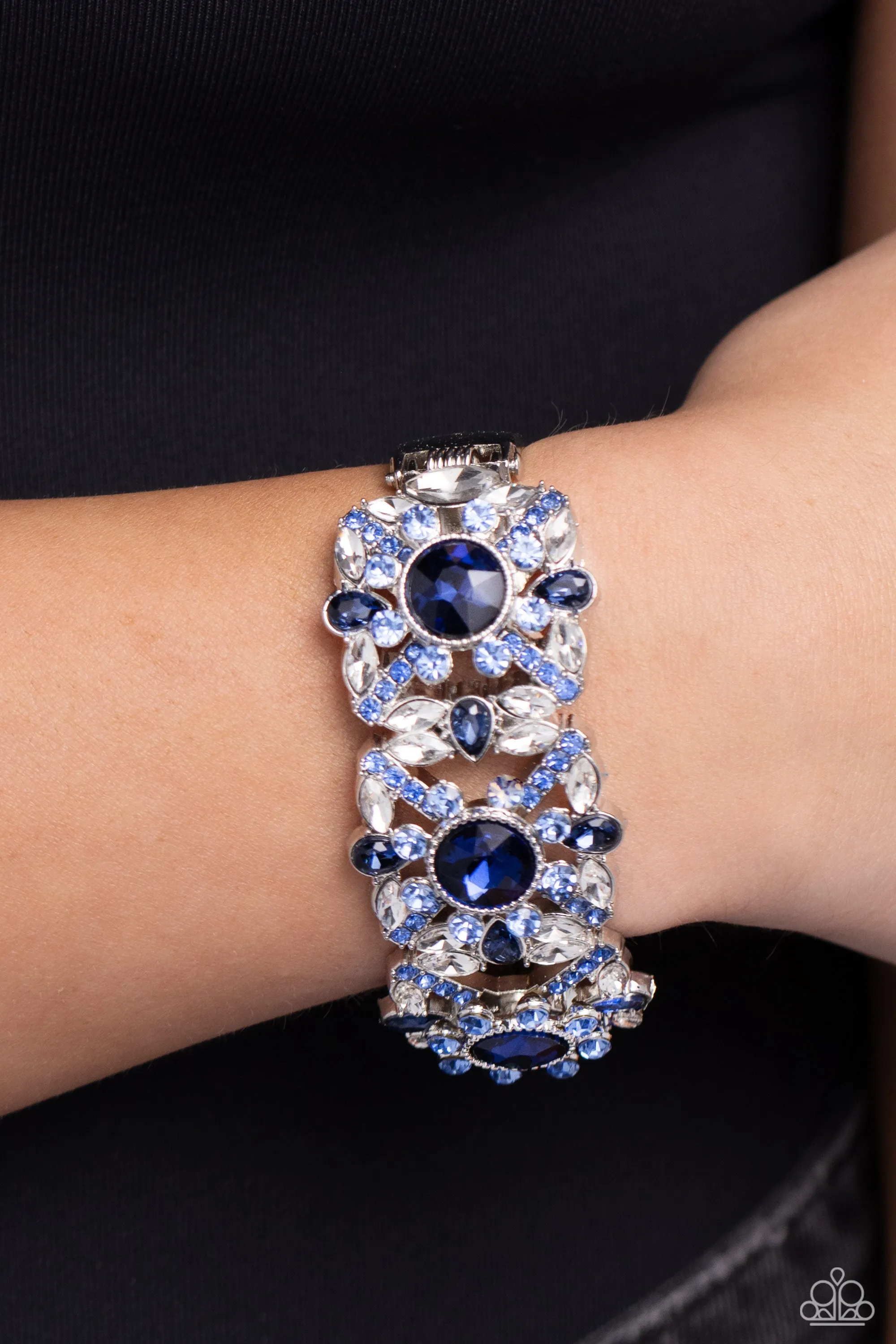 Shimmering Solo - Blue - Rhinestone Encrusted Paparazzi Hinge Bracelet